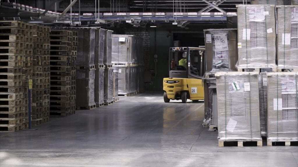 fork-lifter-work-in-big-warehouse-clip-warehouse-2023-11-27-05-13-19-utc-scaled